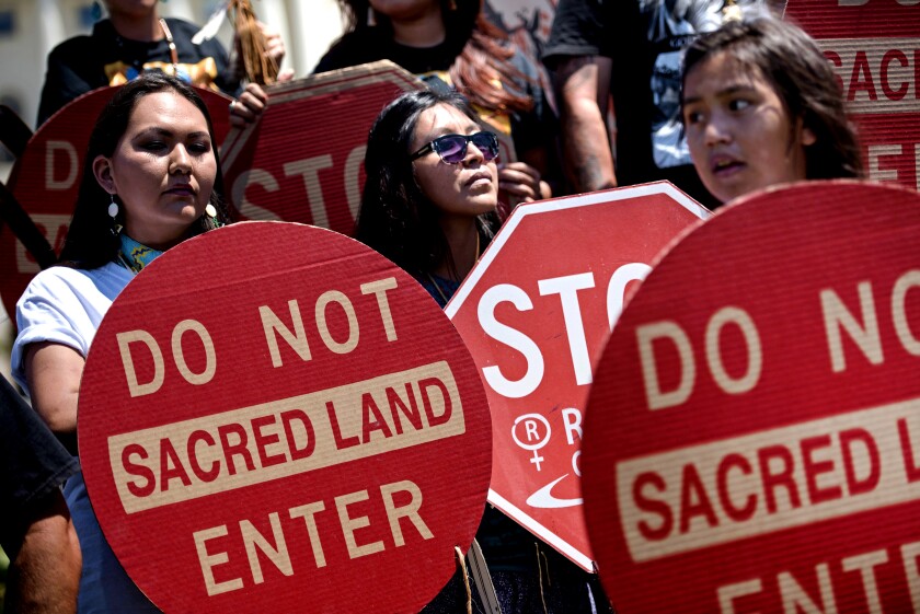 Members of the San Carlos Apache Nation gather to protest on Capitol Hill in 2015.