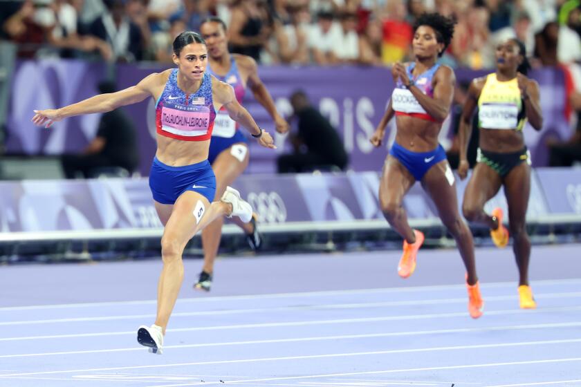 PARIS, FRANCE August 8, 2024-USA's Sydney McLaughlin-Levrone wins the women's 400 hurdles in world record time at the 2024 Paris Olympics Thursday. (Skalij/Los Angeles Times)