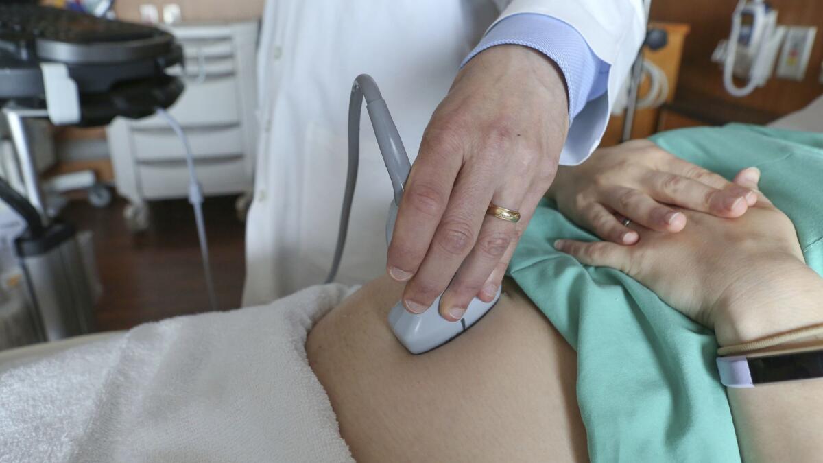 A pregnant woman undergoes an ultrasound at a Chicago hospital on Aug. 7, 2018.