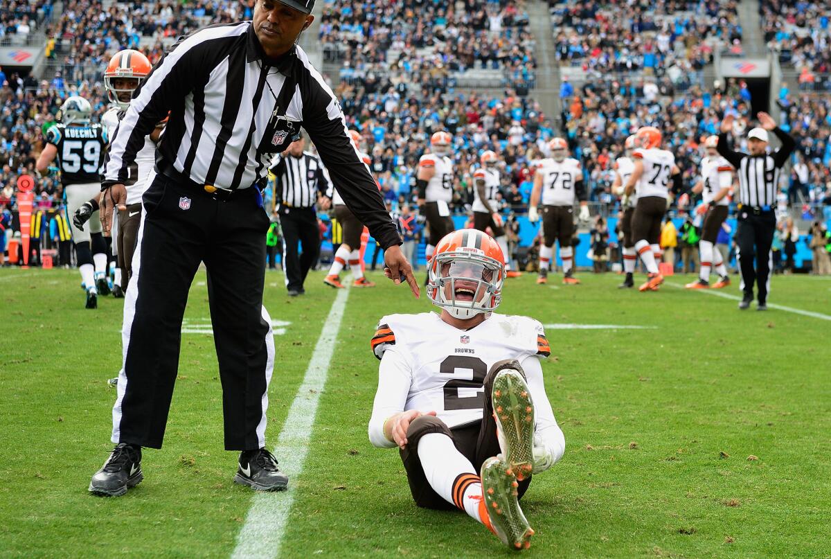 Cleveland Coach Mike Pettine visited quarterback Johnny Manziel, seen here during a December game against the Panthers, in rehab, but says team needs to move forward.