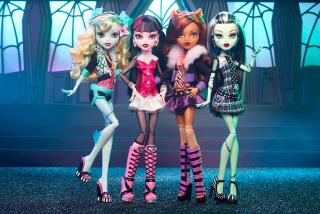 Four plastic dolls of varying skin and hair colors wearing colorful, elaborate outfits