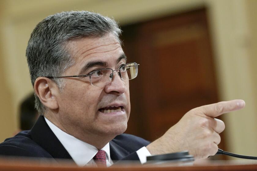 FILE - Health and Human Services Secretary Xavier Becerra testifies during the House Committee hearing on Ways and Means hearing, March 28, 2023, on Capitol Hill in Washington. The Biden administration is moving to make it easier for caregivers to take in family members in the foster care system, requiring states to provide them with the same financial support that any other foster home would receive. The administration also is seeking to provide more protection for LGBTQ+ children. (AP Photo/Mariam Zuhaib, File)