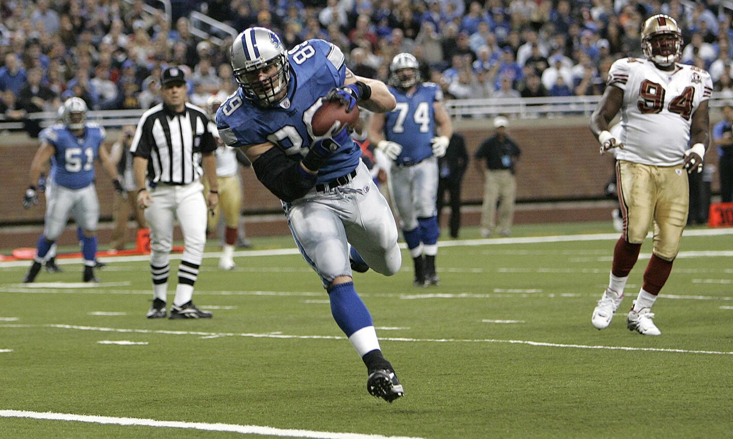Detroit Lions tight end Dan Campbell catches an 8-yard touchdown pass against the San Francisco 49ers in the third quarter of an NFL football game in Detroit, Sunday, Nov. 12, 2006. San Francisco won 19-13. (AP Photo/Paul Sancya)