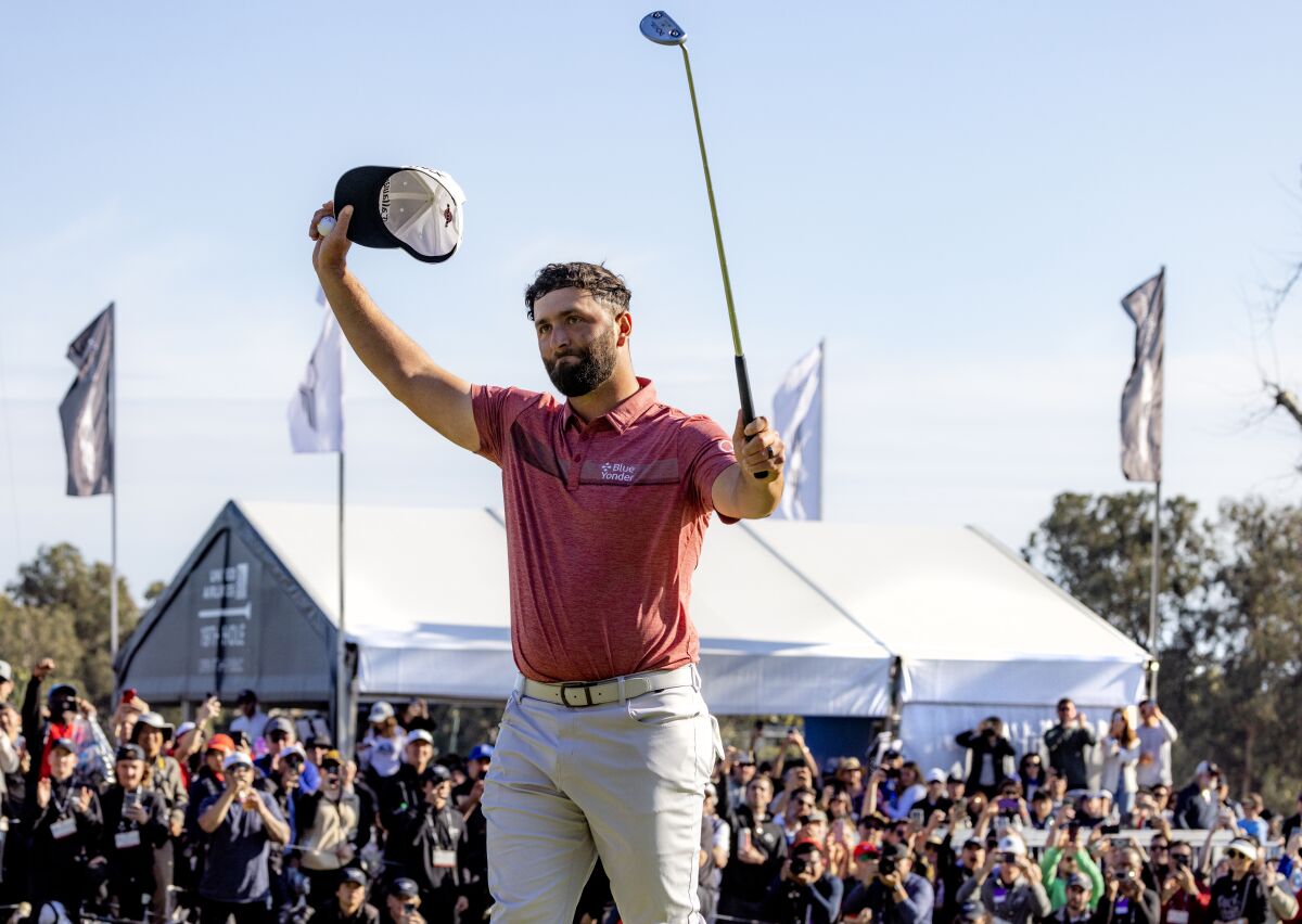Jon Rahm acknowledges the crowd after winning the Genesis Invitational at Riviera Country Club.