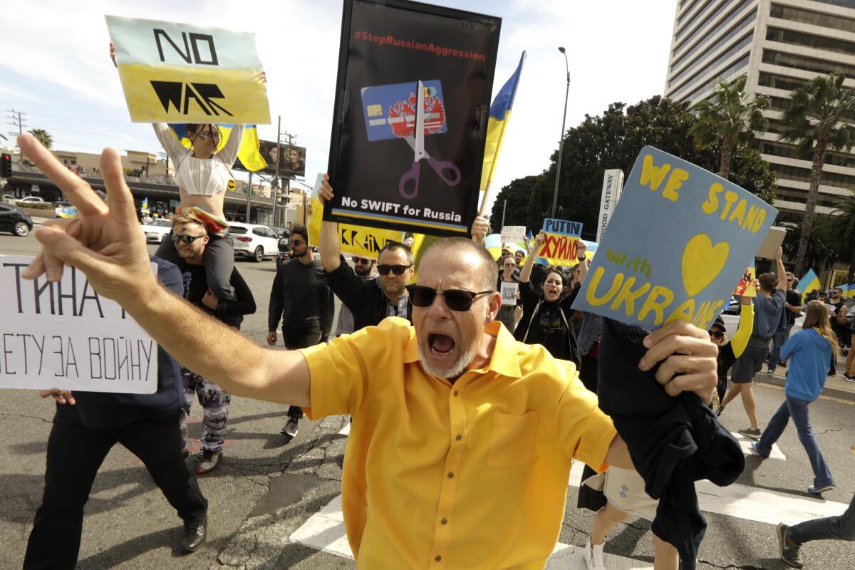 Hundreds of Ukrainian Americans and supporters of Ukraine rally on Santa Monica Blvd.
