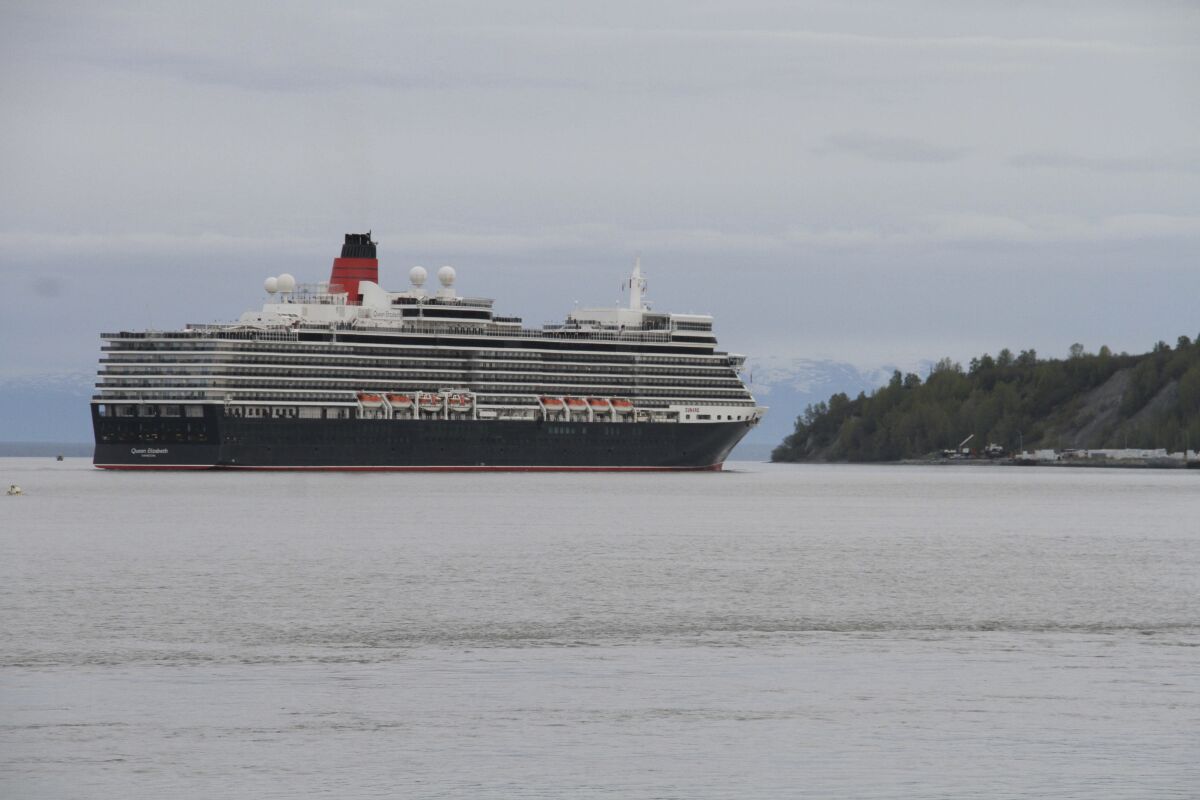 FILE - The Cunard cruise ship Queen Elizabeth sails through Cook Inlet Thursday, May 16, 2019, for a port call in Anchorage, Alaska. Federal officials say a lawsuit in Florida could block cruise ships from visiting Alaska in summer 2021. (AP Photo/Mark Thiessen, File)