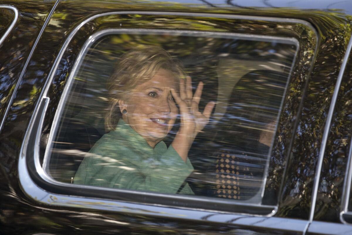 Hillary Clinton arrives at a fundraiser Tuesday hosted by Jessica Biel and Justin Timberlake, who stepped in for Leonardo DiCaprio.