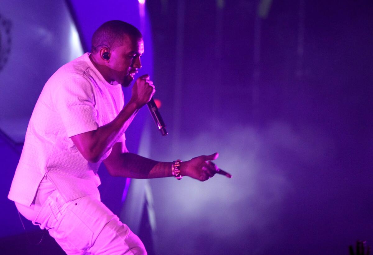 In this July 1, 2012, file photo, Kanye West performs at the BET Awards in Los Angeles.