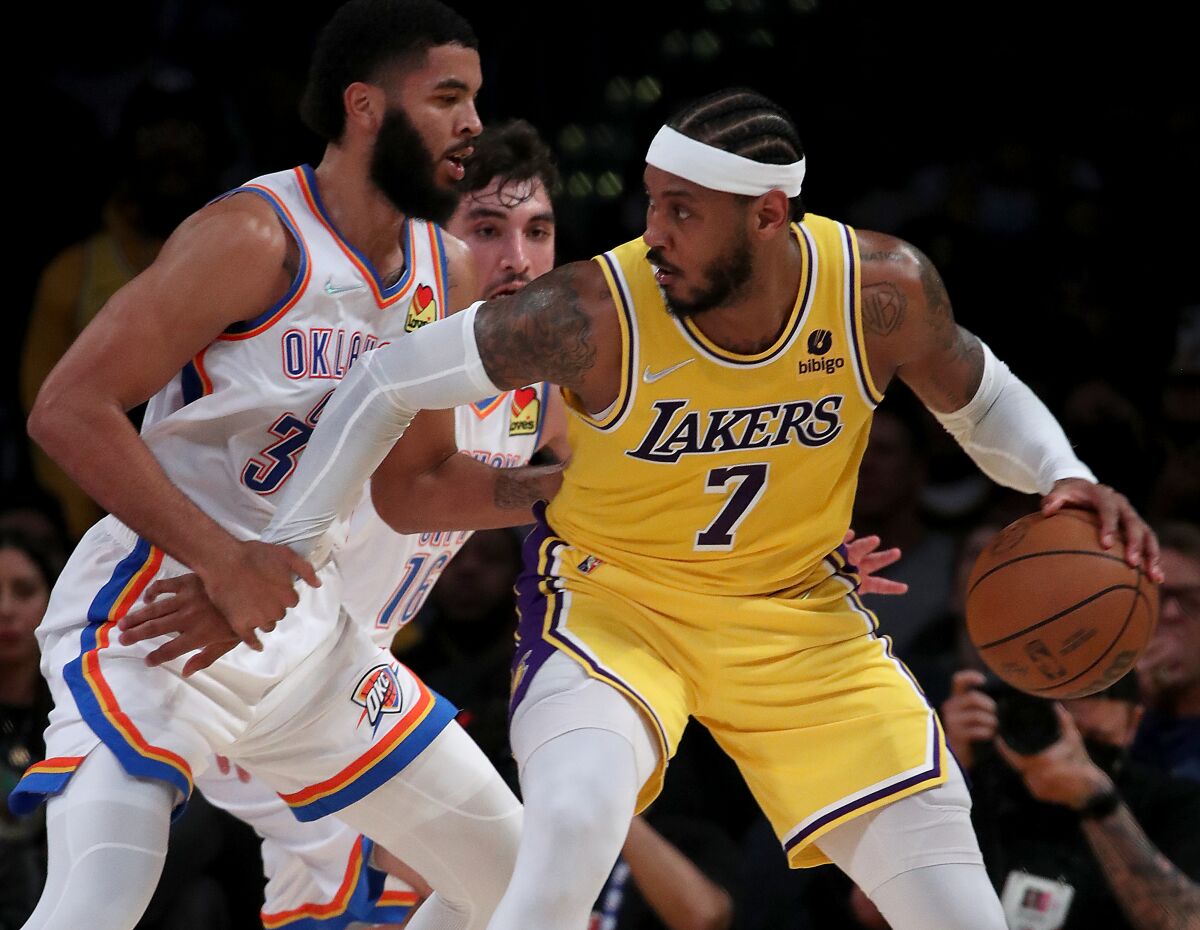 Lakers forward Carmelo Anthony looks for a lane to the basket against the Oklahoma City Thunder.