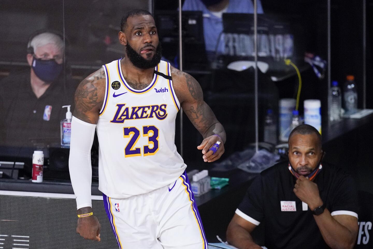 The Lakers' LeBron James looks on during the second half of Game 5 near Orlando, Fla.