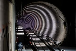 The metro track of the future Wilshire/Fairfax metro station is photographed during an event celebrating the completion of tunneling operations for the Metro D Line Subway Extension Project in Los Angeles, California, USA, 01 April 2024. The event marks the successful completed tunneling for the entire 9-mile underground alignment between the current Wilshire/Western D (Purple) Line station terminus in Koreatown and Westwood/VA Hospital. (Etienne Laurent / For the Times)