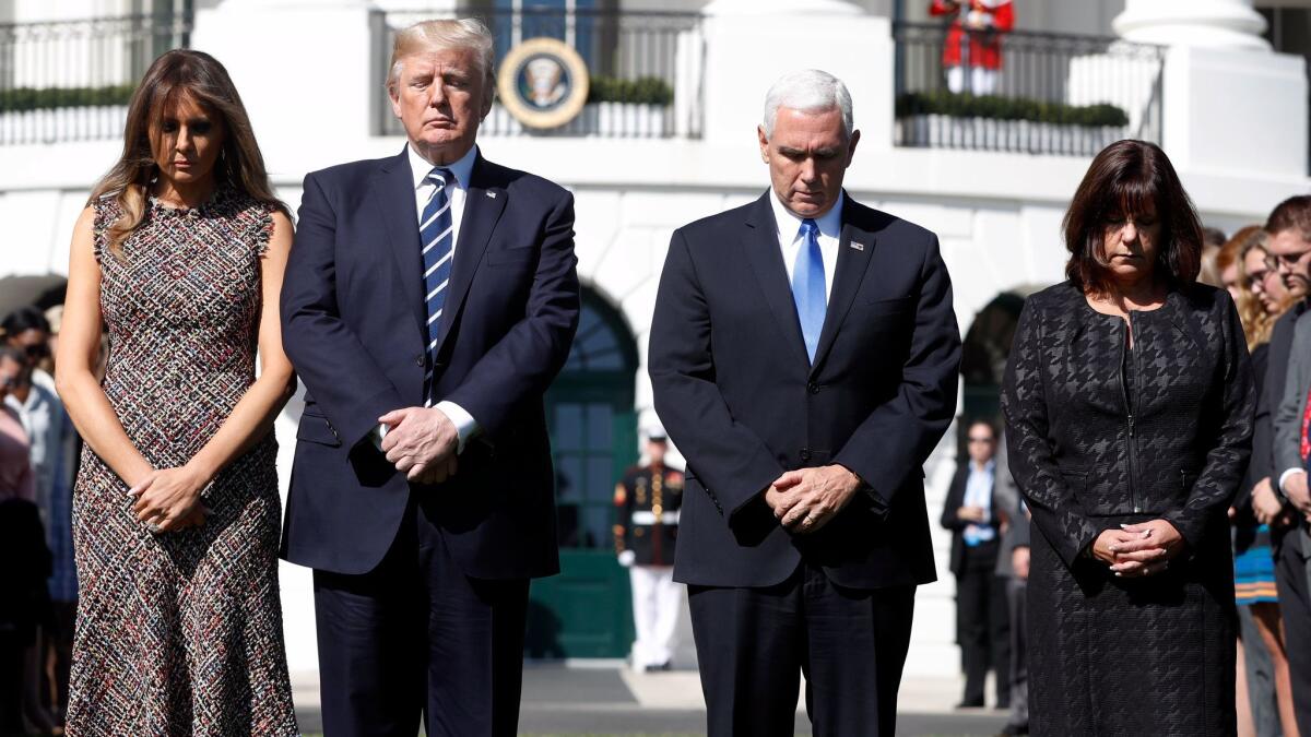 But what do they think about silencers? The Trump and Pence families during a moment of silence to remember the victims of the mass shooting in Las Vegas, on the South Lawn of the White House in Washington, Monday.