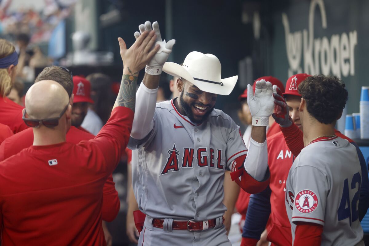 Angels' Jo Adell is congratulated after his home run against the Texas Rangers on April 15 in Arlington, Texas. 