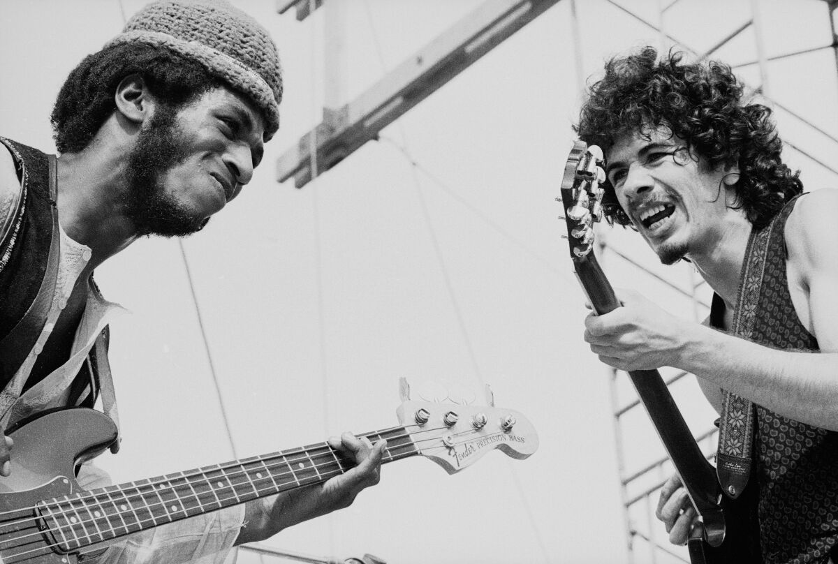 Guitarist Carlos Santana (right) and bassist David Brown