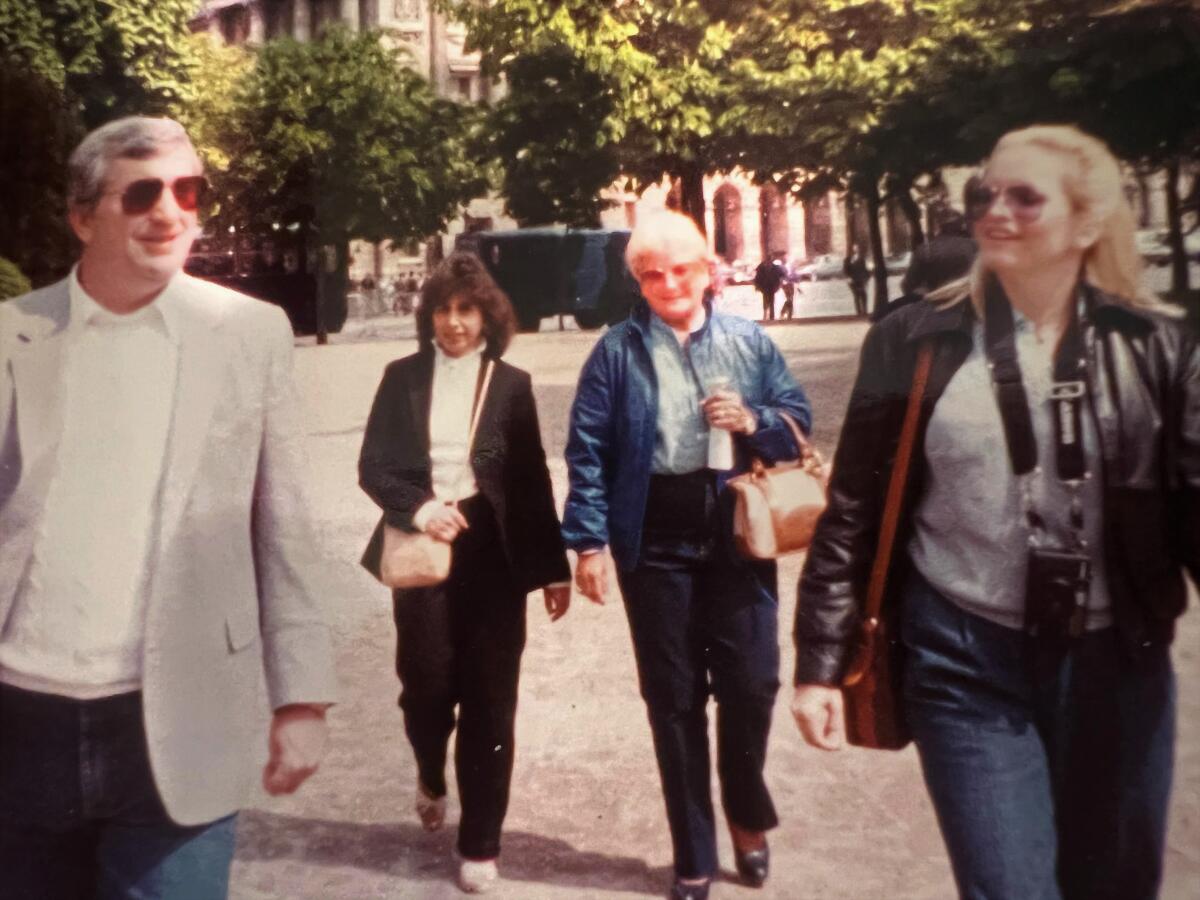 Bob Bennett, from left, Dolly and Paul Rich and Marjie Bennett walk the Champs-Elysees in Paris in 1984.