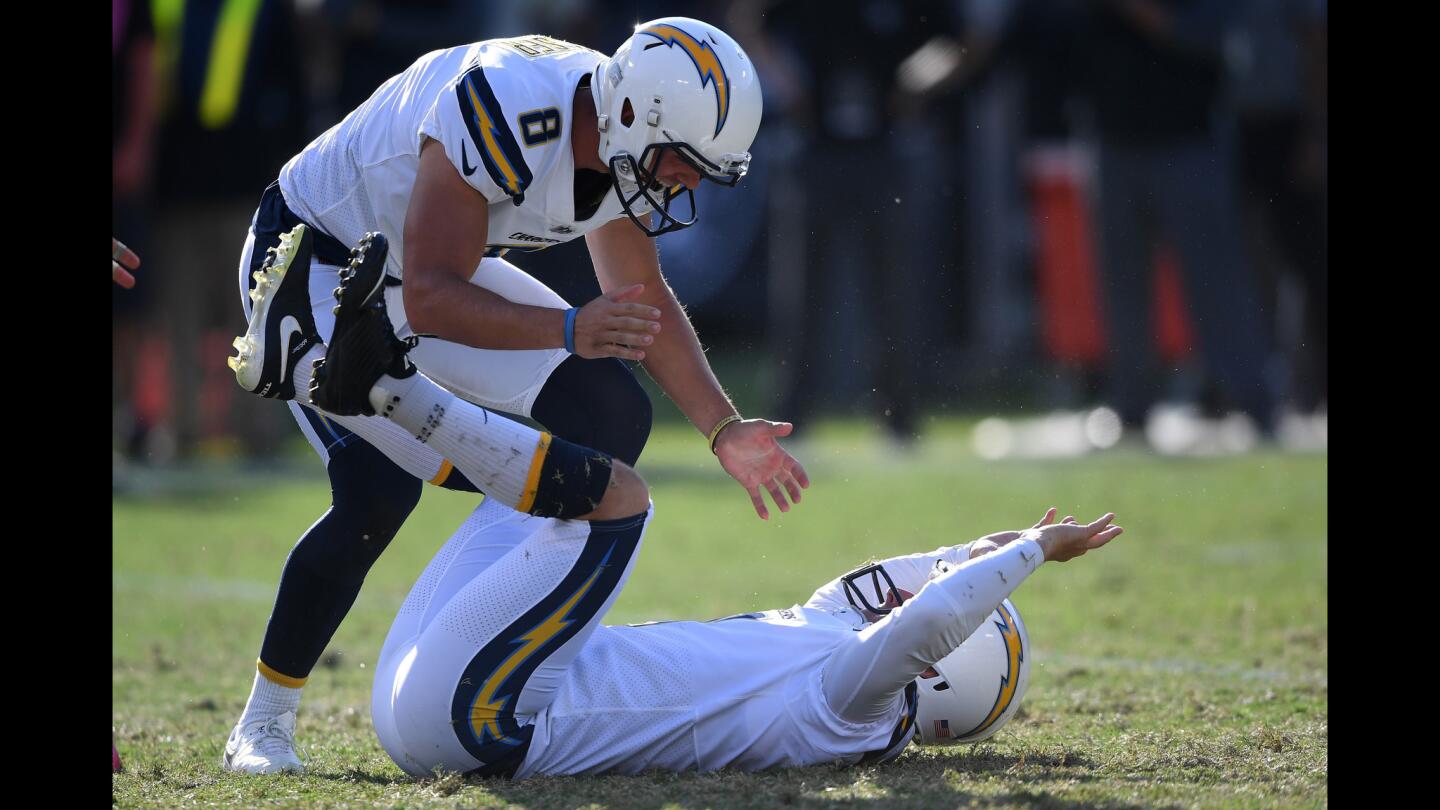 Nick Novak #9 of the Los Angeles Chargers celebrates after kicking the game winning field goal as time expires.