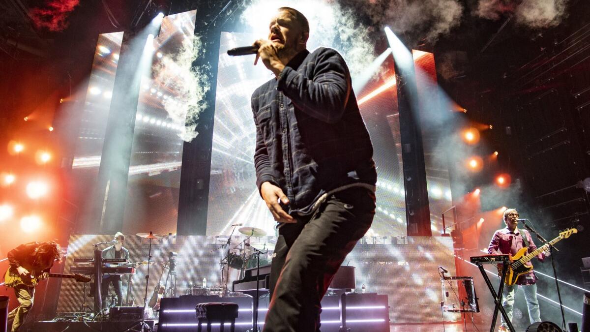 The pop rock band Imagine Dragons with lead vocalist Dan Reynolds performs at the Xfinity Center, in Mansfield, Mass.