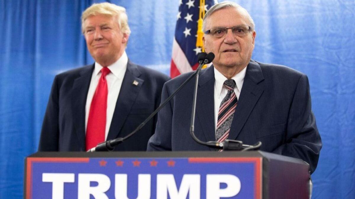 Then-candidate Donald Trump holds a news conference in Iowa with Joe Arpaio in January 2016.