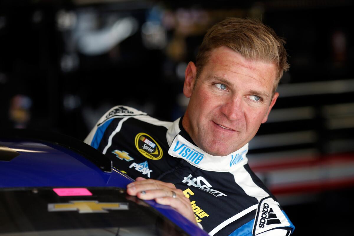 Visine Chevrolet driver Clint Bowyer looks on from the garage during practice for NASCAR's Duck Commander 500 at Texas Motor Speedway on Apr. 7.