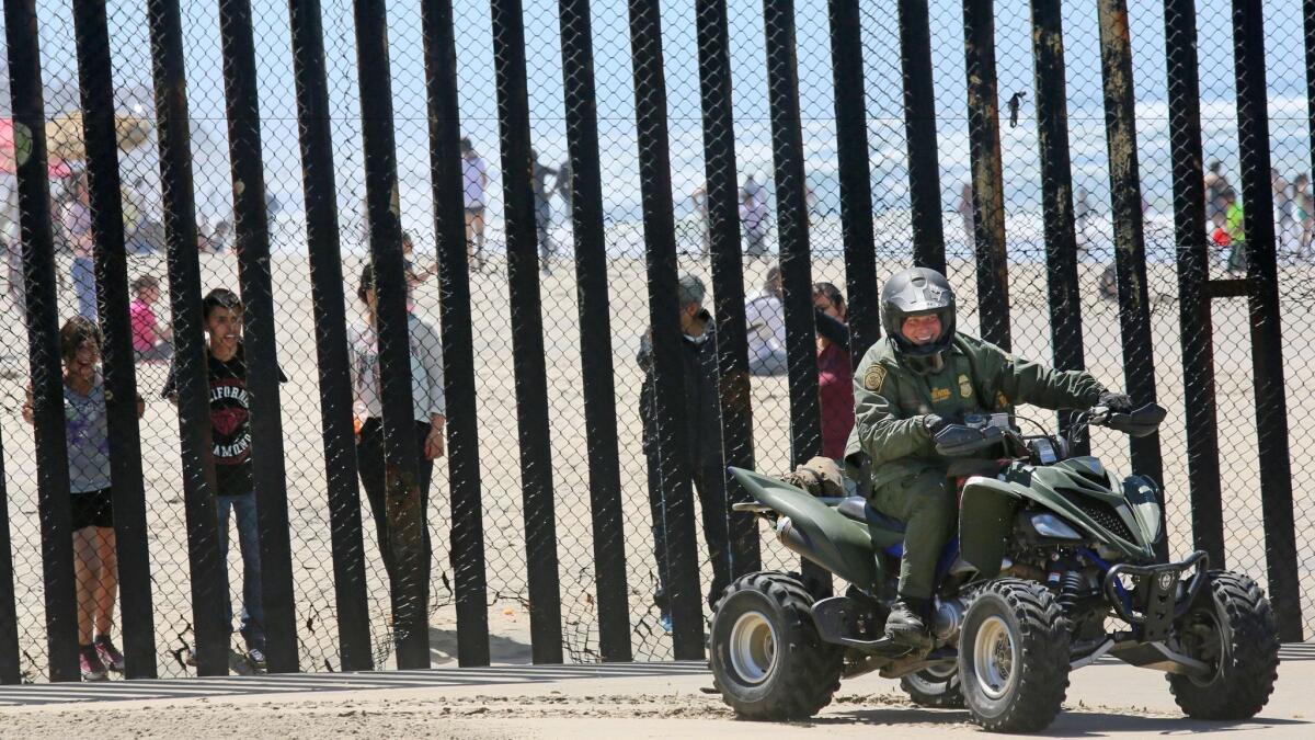 Border Patrol agents patrol the US-Mexico border in San Ysidro, California on April 16, 2017. (Sandy Huffaker / AFP/Getty Images)