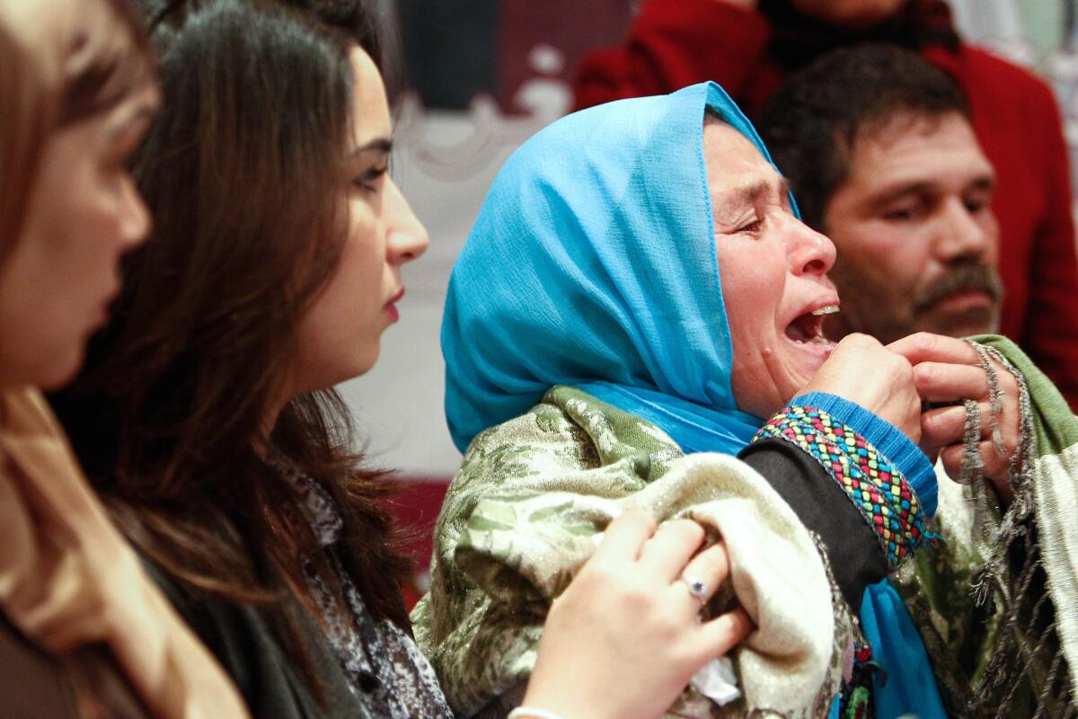 An emotional Zohra Filali, right, in April 2012 delivers a petition to the Moroccan government against the law that allows rapists to escape prosecution by marrying their victims. Her 16-year-old daughter Amina Filali killed herself after such a marriage.