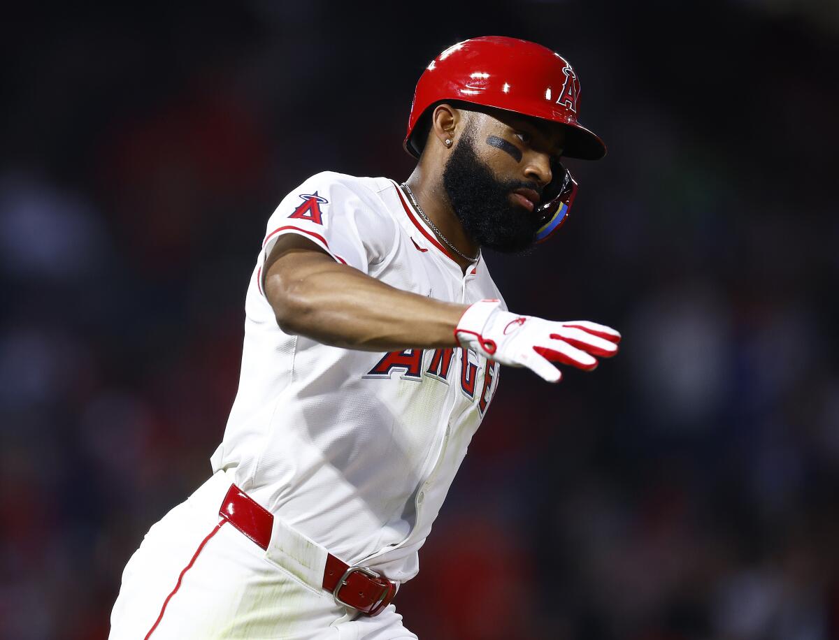 Jo Adell runs the bases after hitting a solo home run for the Angels in the fifth inning Friday night.