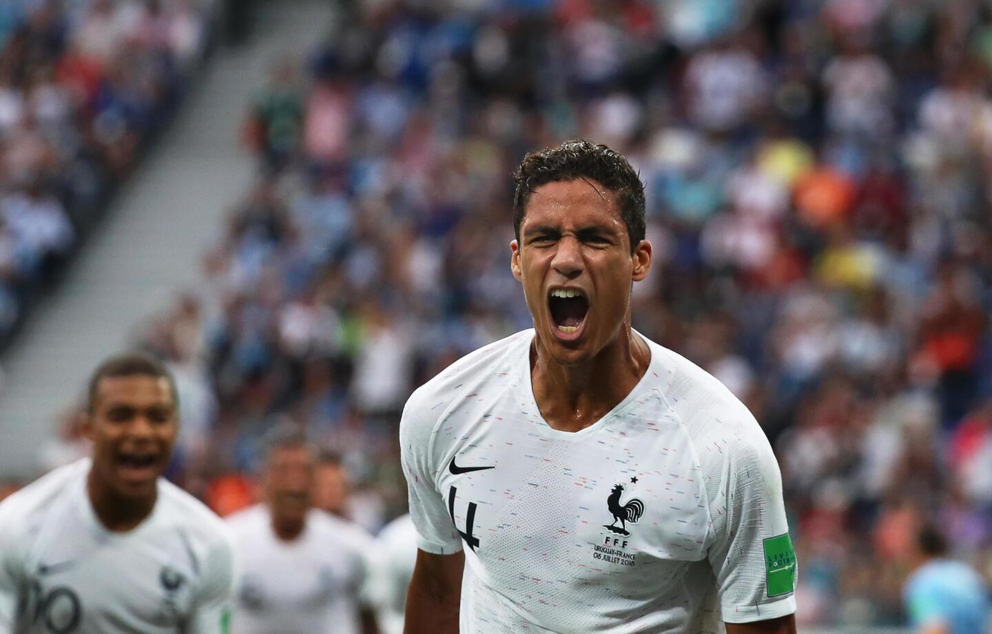 Nizhny Novgorod (Russian Federation), 06/07/2018.- Raphael Varane of France celebrates after scoring the 1-0 lead during the FIFA World Cup 2018 quarter final soccer match between Uruguay and France in Nizhny Novgorod, Russia, 06 July 2018. (RESTRICTIONS APPLY: Editorial Use Only, not used in association with any commercial entity - Images must not be used in any form of alert service or push service of any kind including via mobile alert services, downloads to mobile devices or MMS messaging - Images must appear as still images and must not emulate match action video footage - No alteration is made to, and no text or image is superimposed over, any published image which: (a) intentionally obscures or removes a sponsor identification image; or (b) adds or overlays the commercial identification of any third party which is not officially associated with the FIFA World Cup) (Mundial de Fútbol, Rusia, Francia) EFE/EPA/VASSIL DONEV EDITORIAL USE ONLY ** Usable by HOY and SD Only **