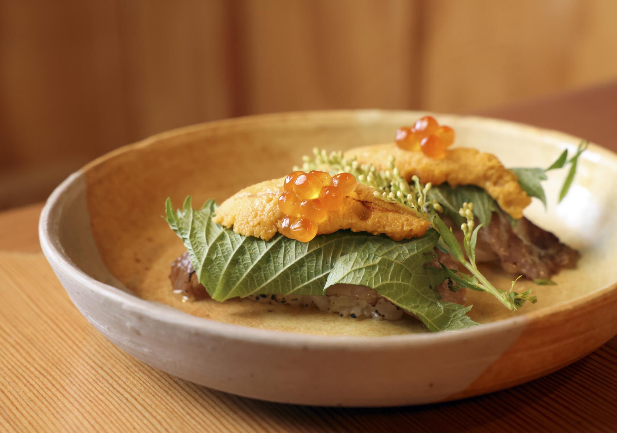 A dish made with beef, salmon roe and unagi is served at Izakaya Full Moon on May 5, 2022, at Ojai, CA.