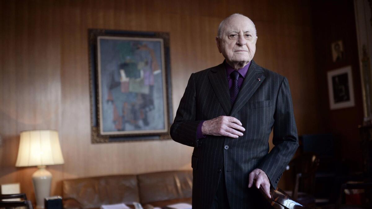 French businessman Pierre Berge poses at his office in Paris in 2015.