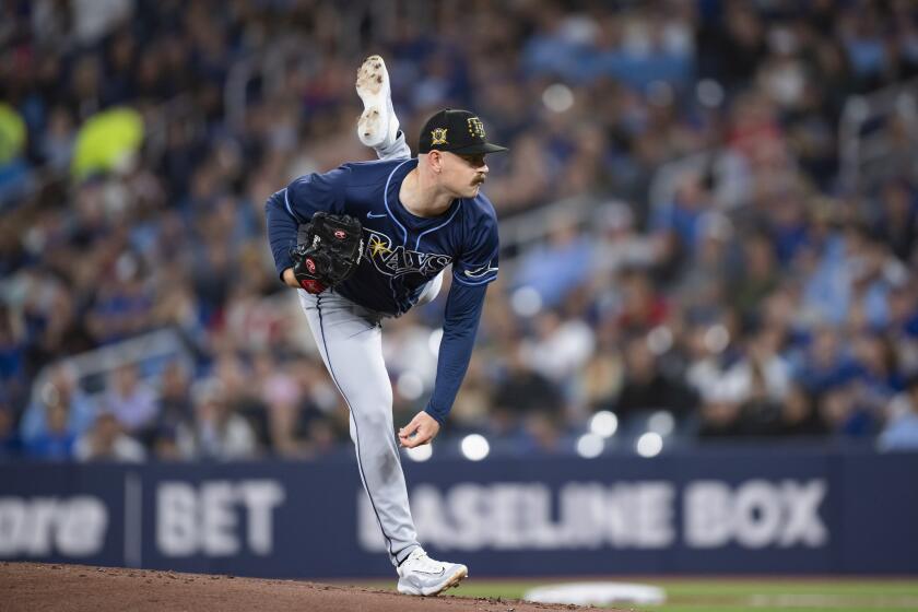 Tampa Bay Rays starting pitcher Tyler Alexander watches. a throw to a Toronto Blue Jays batter during a baseball game Friday, May 17, 2024, in Toronto. (Christopher Katsarov/The Canadian Press via AP)