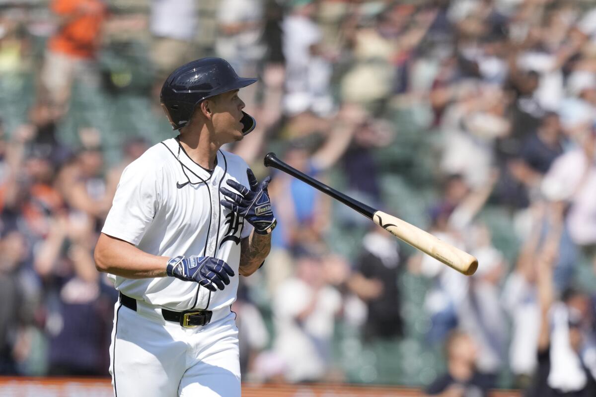 Detroit's Gio Urshela flips his bat after connecting for a winning, two-run home run in the 10th inning Saturday.