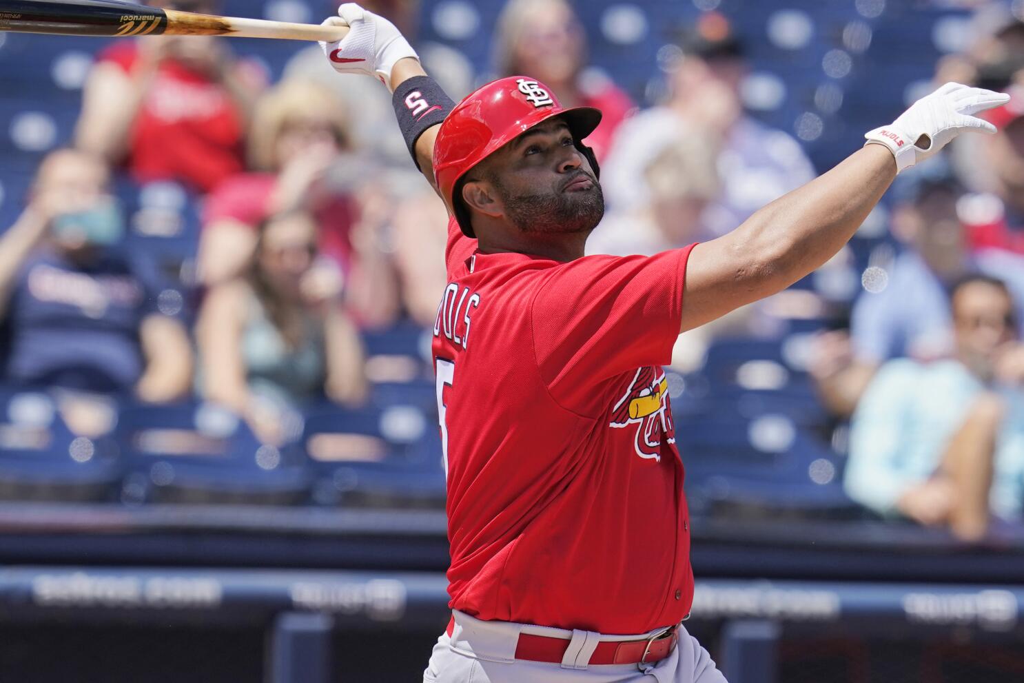 Pujols gets spring hit for Cards with wife in brain surgery