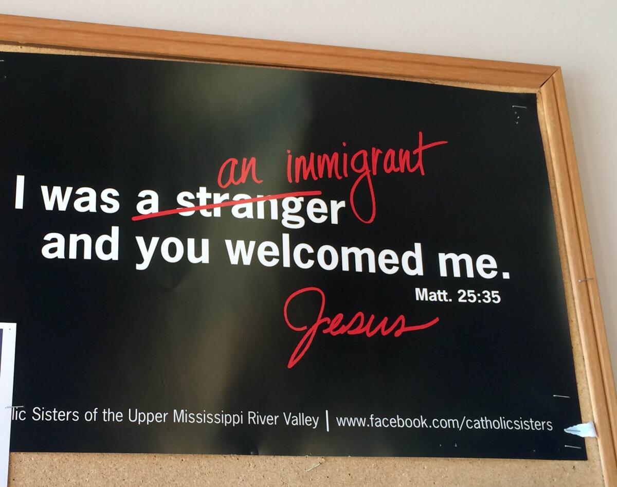 The Hispanic Ministry at St. Mary's Catholic Church has played a vital role assimilating Marshalltown's growing Latino population. A sign outside the sanctuary offers a comforting message.