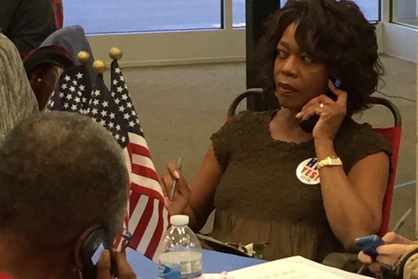 Alfre Woodard cold-calls voters from a Hillary Clinton campaign office in west Philadelphia.