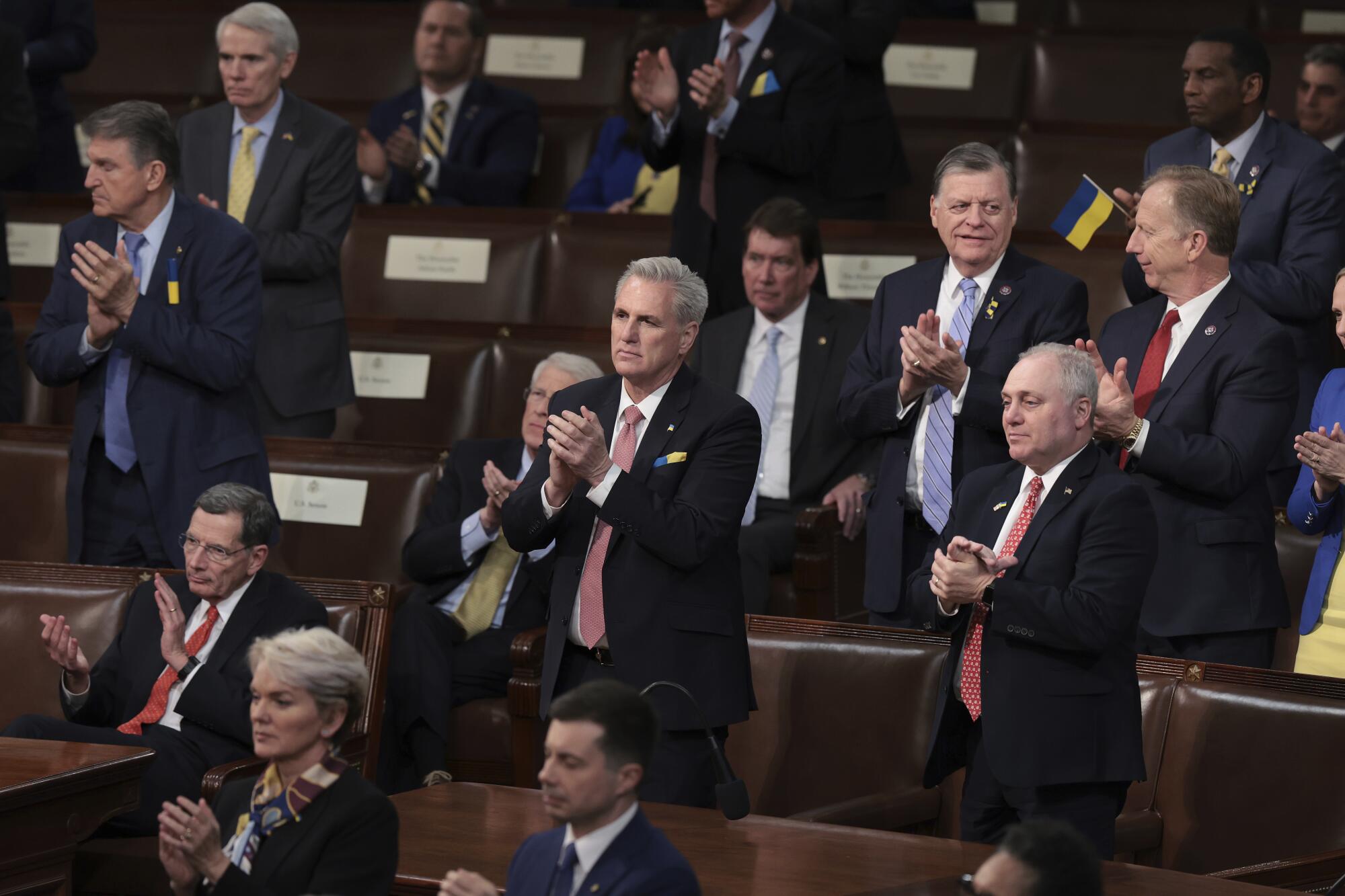 House Republicans clap.
