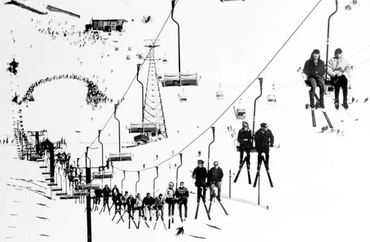 Skiers on a chairlift at Mammoth Mountain