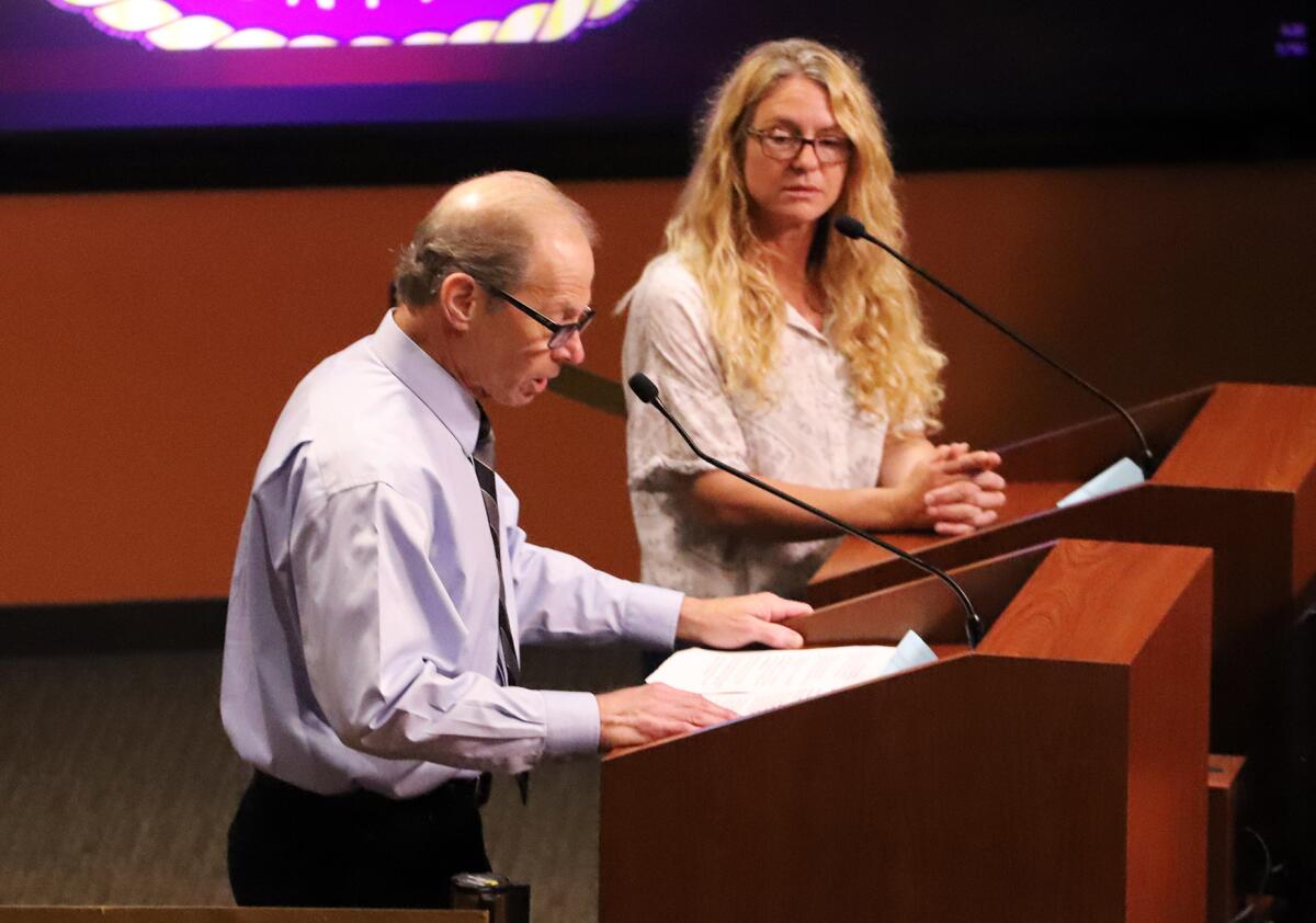 Andrew Einhorn, left, gives his comments about the invocation prayer being said before the City Council meetings on Tuesday.