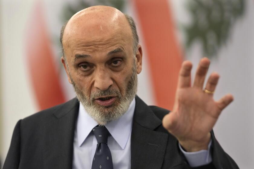 Samir Geagea, leader of the Christian Lebanese Forces party, gestures as he speaks during an interview with the Associated Press, in Maarab east of Beirut, Tuesday, April 30, 2024. Geagea blasted the Shiite militant group Hezbollah for opening a front with Israel to back up its ally Hamas, saying it has harmed Lebanon without making a dent in Israel's crushing offensive in the Gaza Strip. (AP Photo/Hussein Malla)
