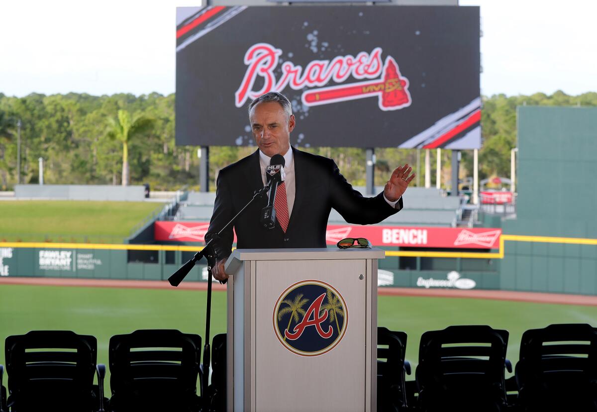MLB Commissioner Rob Manfred takes questions about the Houston Astros while holding his press conference during the "Florida Governor's Dinner" kicking off spring training on Sunday in North Port, Fla.