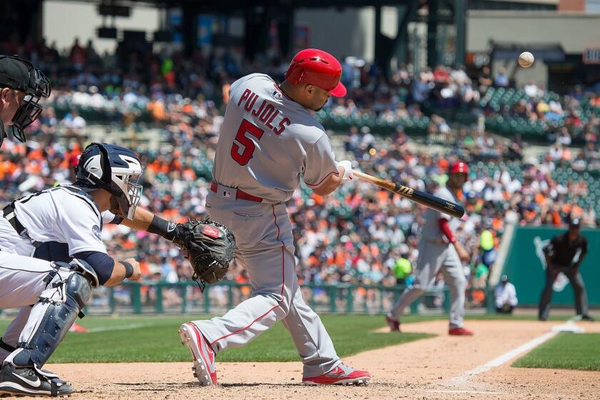 DETROIT, MI - JUNE 08: Albert Pujols #5 of the Los Angeles Angels of Anaheim hits a sacrifice fly in the fifth inning during a MLB game against the Detroit Tigers at Comerica Park on June 8, 2017 in Detroit, Michigan. (Photo by Dave Reginek/Getty Images) ** OUTS - ELSENT, FPG, CM - OUTS * NM, PH, VA if sourced by CT, LA or MoD **
