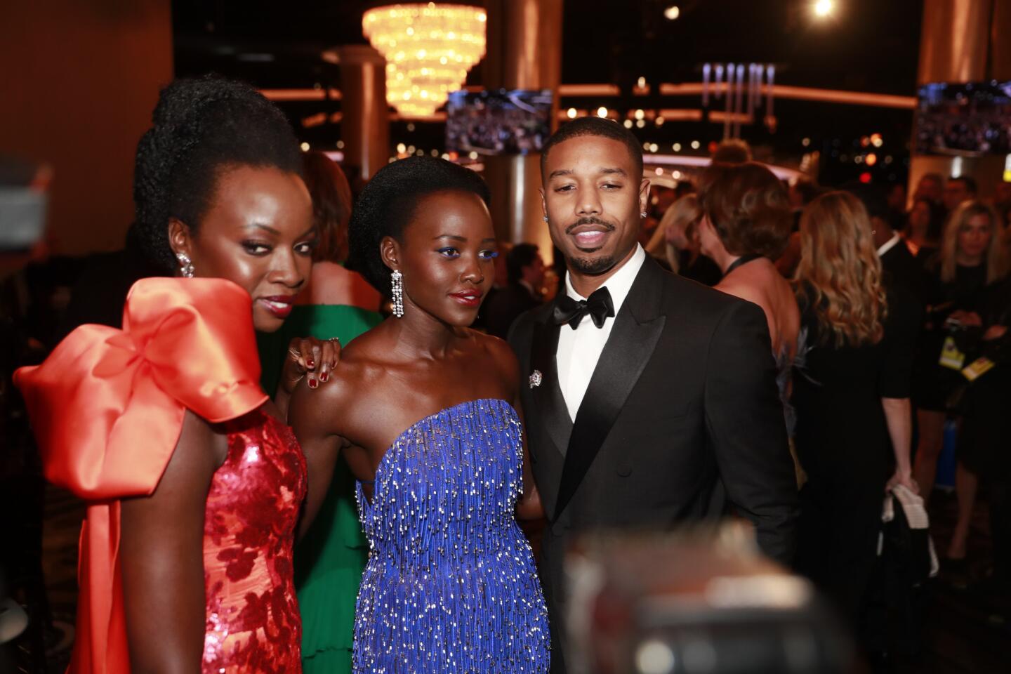 "Black Panther" stars Danai Gurira, Lupita Nyong'o and Michael B. Jordan are photographed in the Beverly Hilton International Ballroom during the 76th Golden Globes.