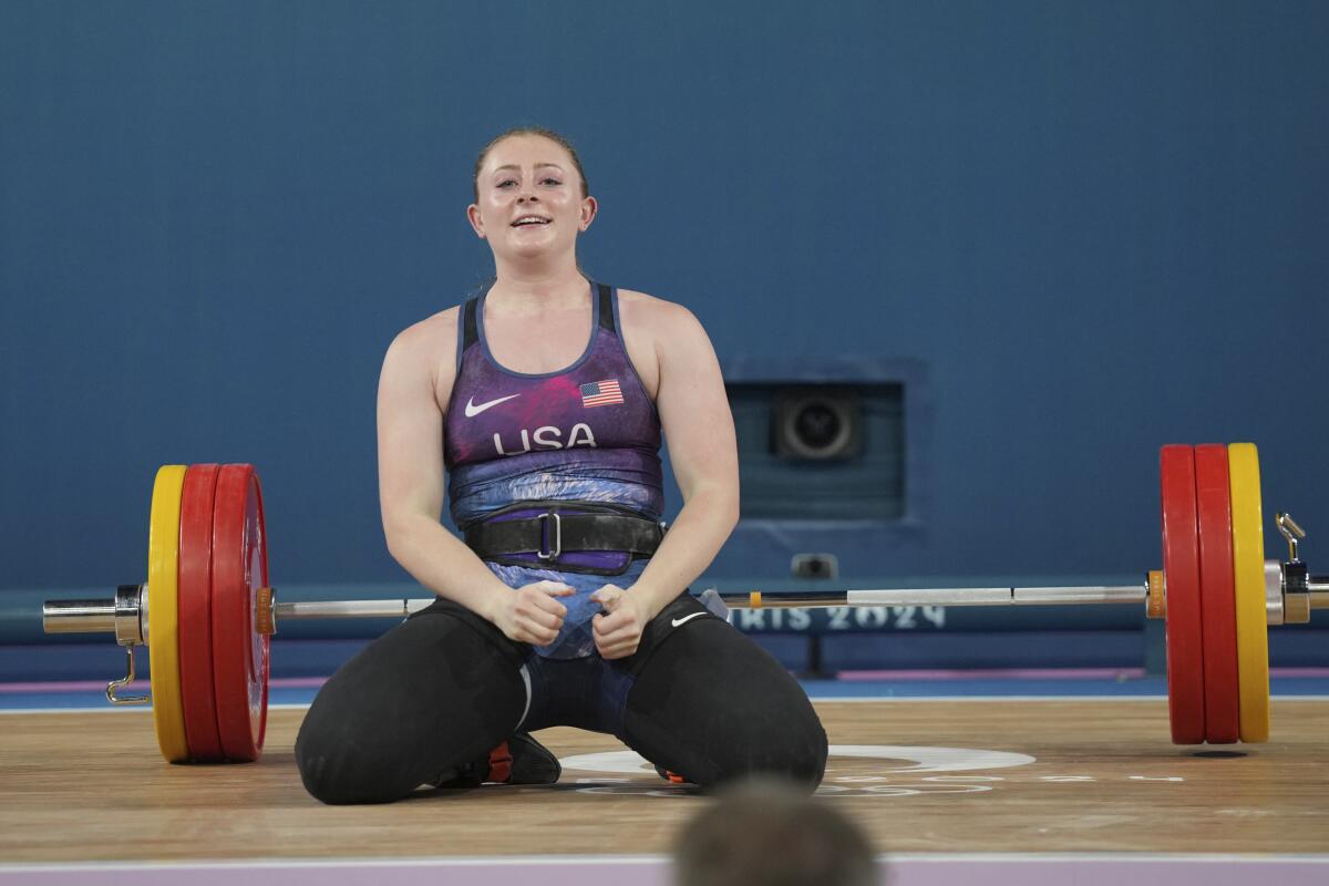 American Olivia Reeves celebrates as she wins the gold medal during the women's 71kg weightlifting event 