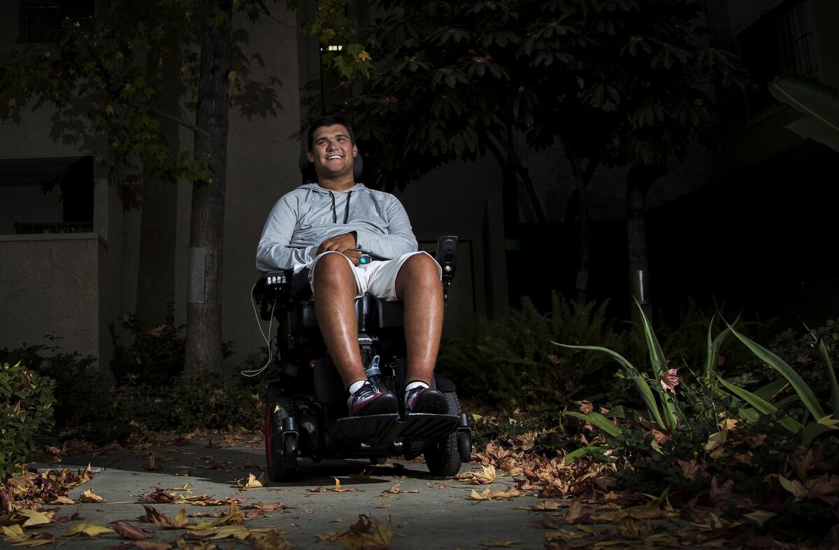 Jack Jablonski sits in a wheelchair.