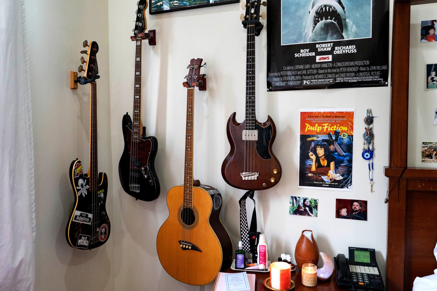 Guitars hang from the walls, alongside vintage posters of “Jaws” and “Pulp Fiction,” and ads for Space Mountain and Snow White’s Adventures at Fantasyland.