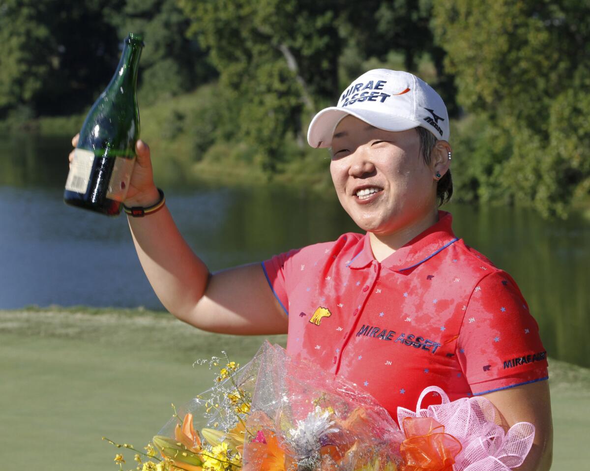 Jiyai Shin celebrates winning the Kingsmill Championship.