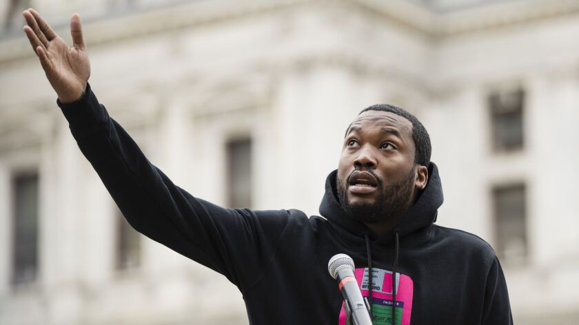 Meek Mill speaks at a gathering in Philadelphia in April to push for drastic changes to Pennsylvania's probation system.