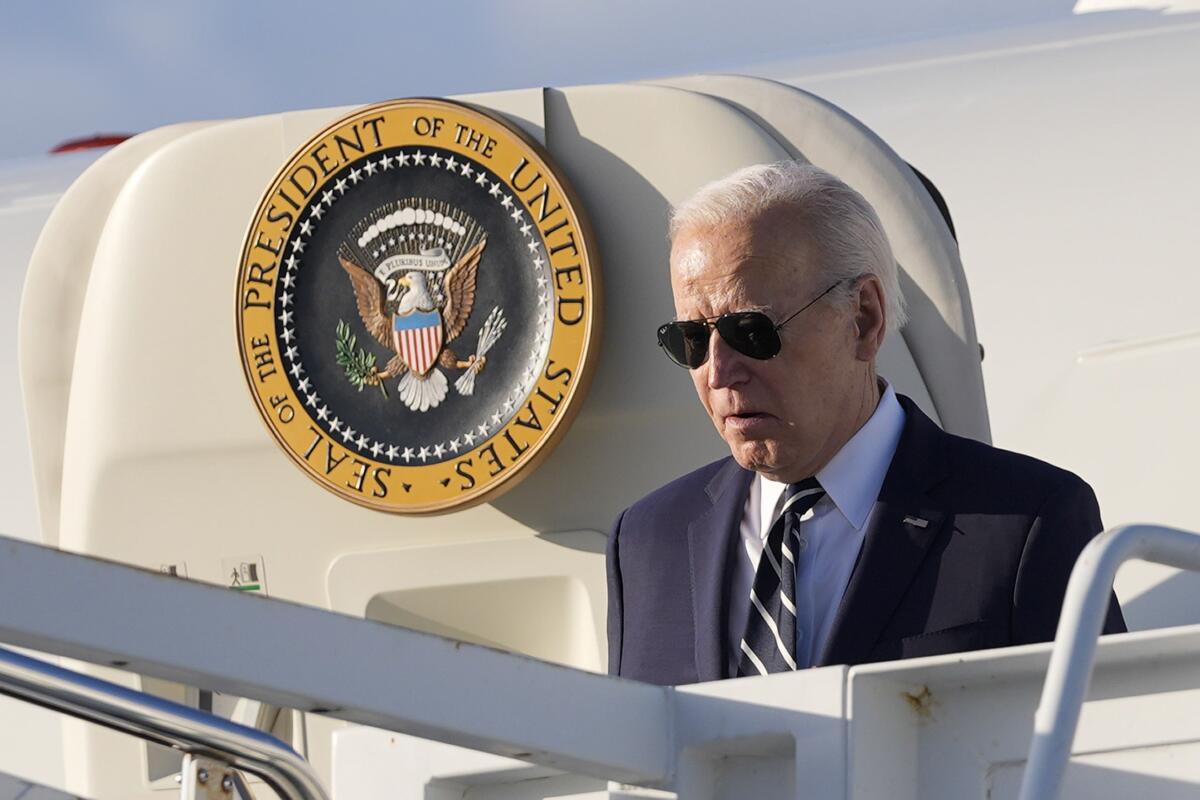 President Biden boards Air Force One.