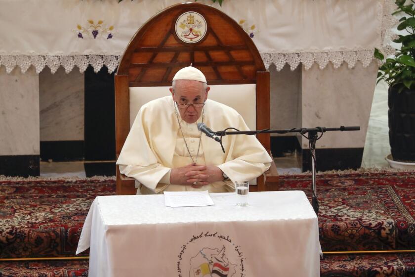 Pope Francis delivers his speech during a meeting with bishops and priests, at the Sayidat al-Nejat (Our Lady of Salvation) Cathedral, in Baghdad, Iraq, Friday, March 5, 2021. Pope Francis has arrived in Iraq to urge the country's dwindling number of Christians to stay put and help rebuild the country after years of war and persecution, brushing aside the coronavirus pandemic and security concerns. (AP Photo/Andrew Medichini)