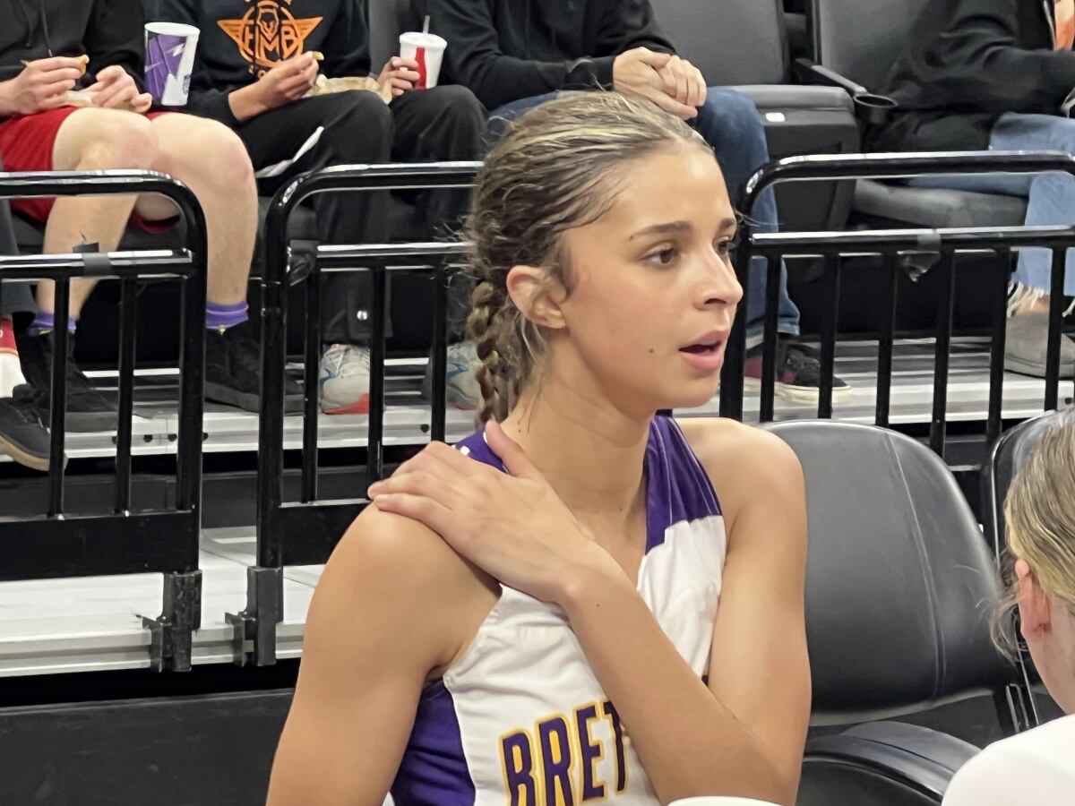 Aariah Fox sits on the bench after leading Bret Harte High to the Division V girls' state basketball title Saturday.