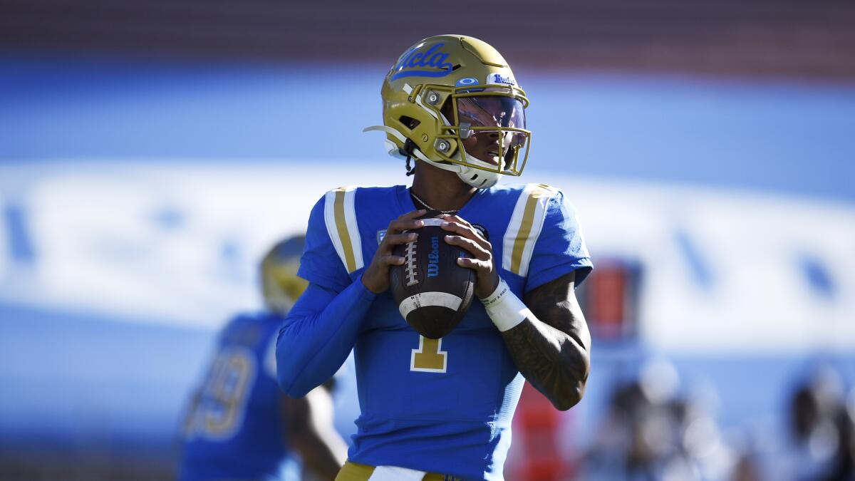 UCLA quarterback Dorian Thompson-Robinson looks to pass during the first half of a game.